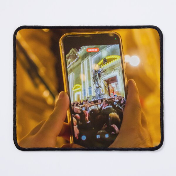 Item preview, Person Capturing Large Night Crowd At Decorative City Event On Smartphone With Festive Lighting And Architecture designed and sold by Nmallia.