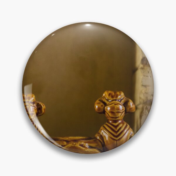 Item preview, Pair Of Brown Ceramic Monkey Figurines Framing Decorative Shield Plaque In A Brick Archway designed and sold by Nmallia.