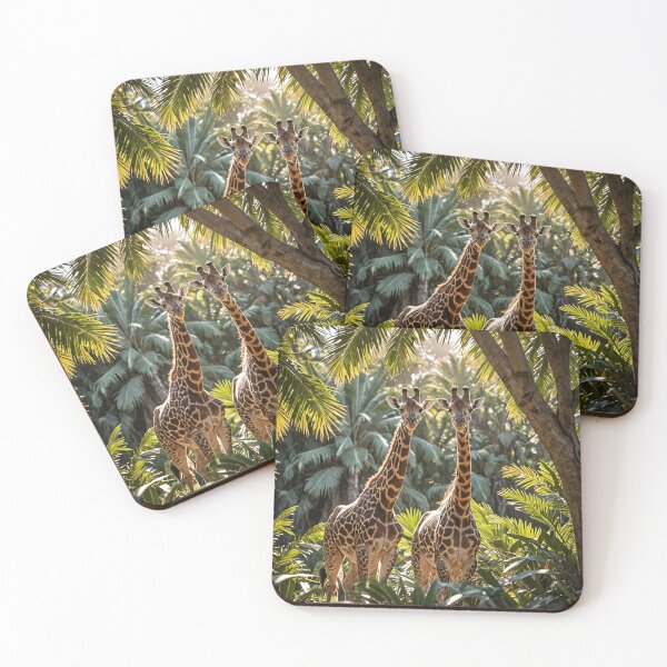Item preview, Two beautiful giraffes between trees in a jungle designed and sold by simeonred.