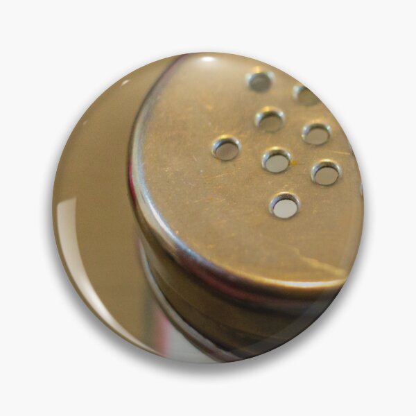 Item preview, Close-Up of Metal-Top Salt Shaker on Wooden Table for Dining and Seasoning designed and sold by Nmallia.