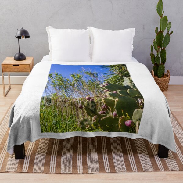 Item preview, Prickly Pear Cactus With Purple Fruit Under Clear Blue Sky Among Tall Grasses And Palm Leaves designed and sold by Nmallia.