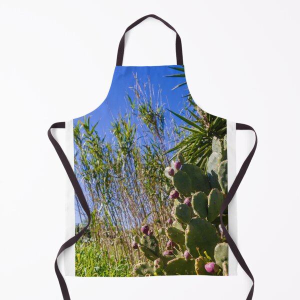 Item preview, Prickly Pear Cactus With Purple Fruit Under Clear Blue Sky Among Tall Grasses And Palm Leaves designed and sold by Nmallia.