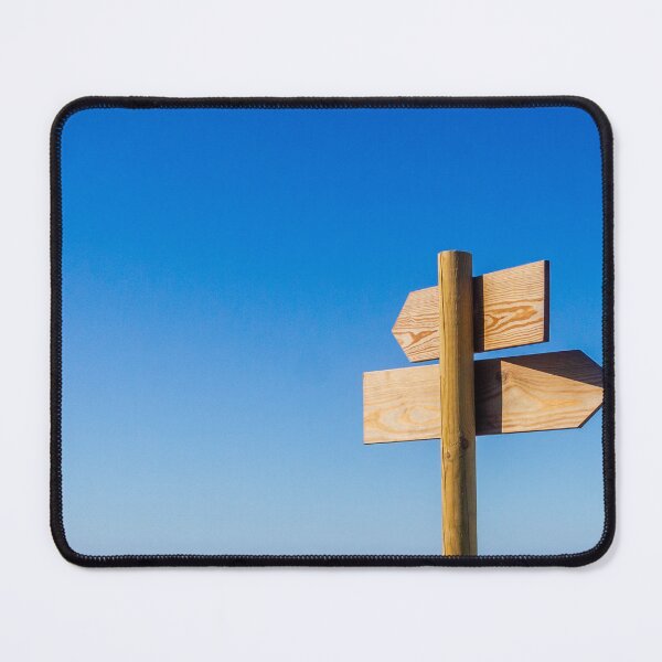 Item preview, Wooden Signpost With Arrow Signs Pointing Directions Against Blue Sky And Sea Horizon designed and sold by Nmallia.