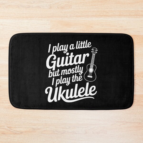 Item preview, I Play a Little Guitar but Mostly I Play the Ukulele designed and sold by Frank Ring.
