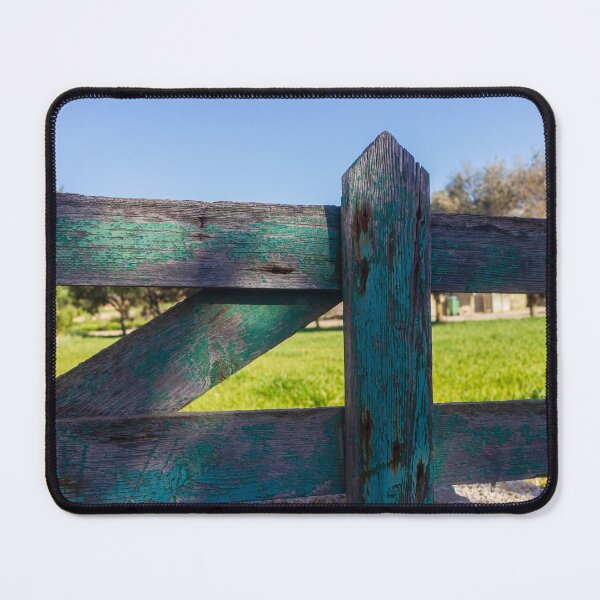 Item preview, Rustic Weathered Wooden Fence With Peeling Green Paint Overlooking Sunny Rural Field designed and sold by Nmallia.