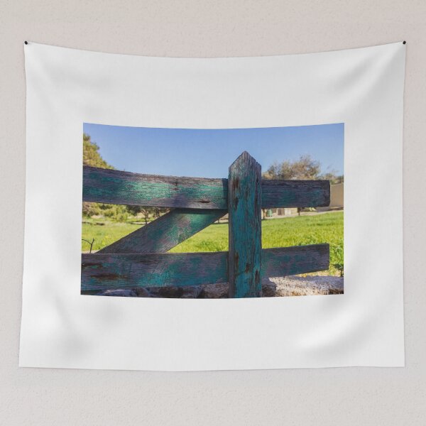 Item preview, Rustic Weathered Wooden Fence With Peeling Green Paint Overlooking Sunny Rural Field designed and sold by Nmallia.