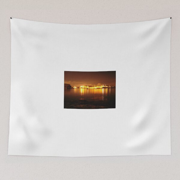 Item preview, Nighttime Harbor Cityscape With Golden Lights Reflected On Calm Waterfront designed and sold by Nmallia.