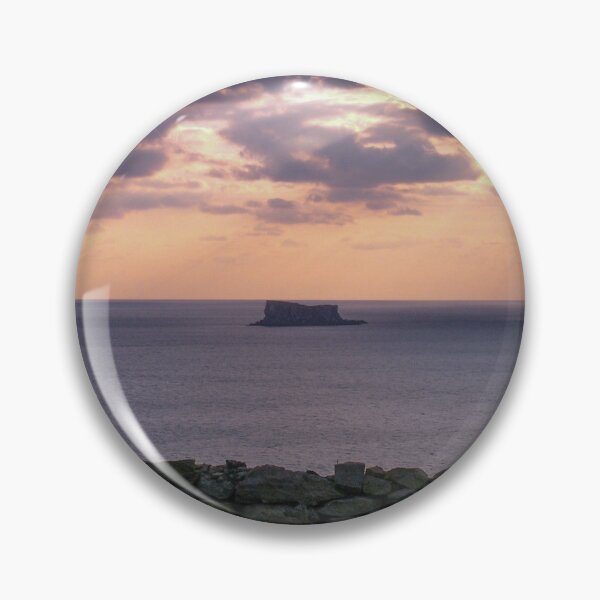 Item preview, Sunset Over Sea With Distant Islet and Foreground Stone Wall Under Dramatic Cloudy Sky designed and sold by Nmallia.