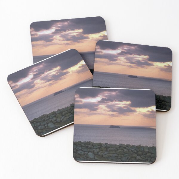 Item preview, Sunset Over Sea With Distant Islet and Foreground Stone Wall Under Dramatic Cloudy Sky designed and sold by Nmallia.