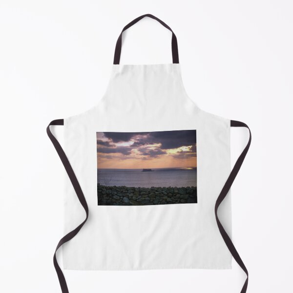 Item preview, Sunset Over Sea With Distant Islet and Foreground Stone Wall Under Dramatic Cloudy Sky designed and sold by Nmallia.