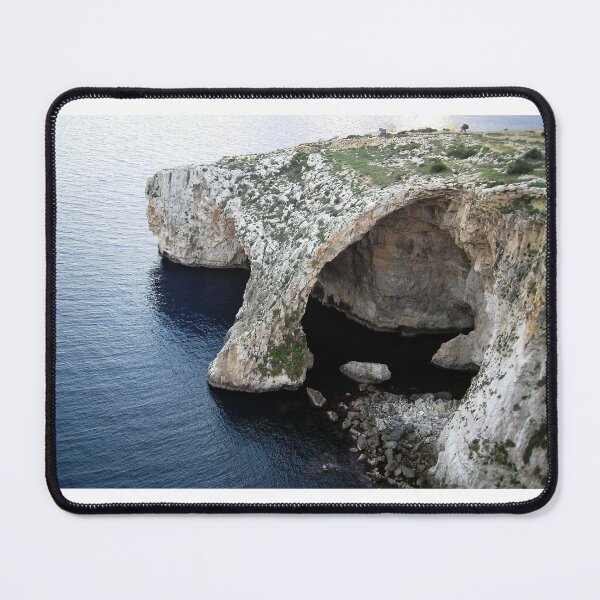 Item preview, Sea Cave Arch On Limestone Cliff Over Deep Blue Mediterranean Sea Coastline With Rocky Shore designed and sold by Nmallia.