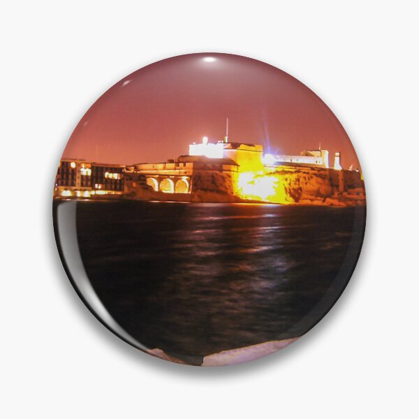 Item preview, Illuminated Night Waterfront Fortress With Rocky Foreground and Long Exposure Reflections designed and sold by Nmallia.