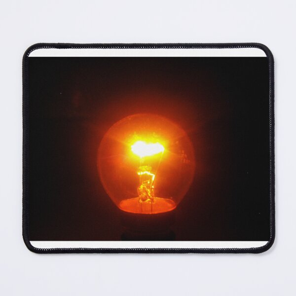 Item preview, Glowing Incandescent Light Bulb With Visible Filament Illuminating Warm Orange Light In Dark designed and sold by Nmallia.