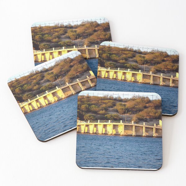 Item preview, Sunlit Stone Seawall With People Fishing Along Coastal Promenade At Golden Hour designed and sold by Nmallia.