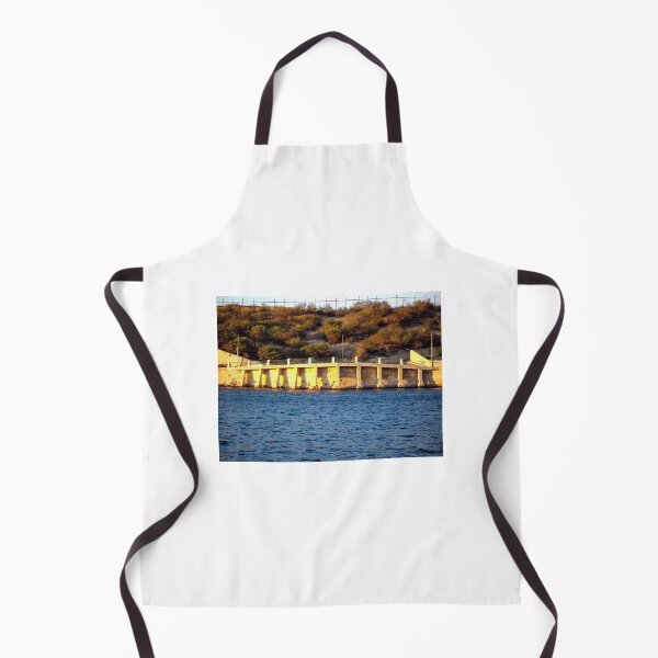 Item preview, Sunlit Stone Seawall With People Fishing Along Coastal Promenade At Golden Hour designed and sold by Nmallia.
