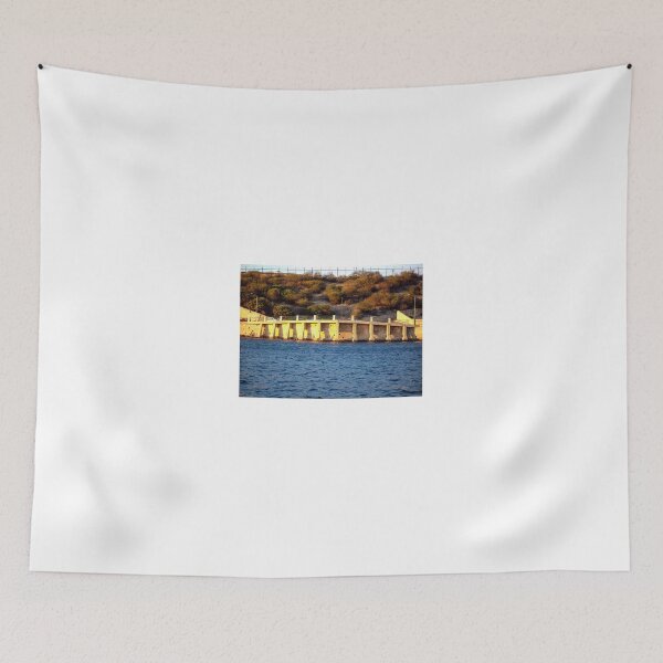 Item preview, Sunlit Stone Seawall With People Fishing Along Coastal Promenade At Golden Hour designed and sold by Nmallia.