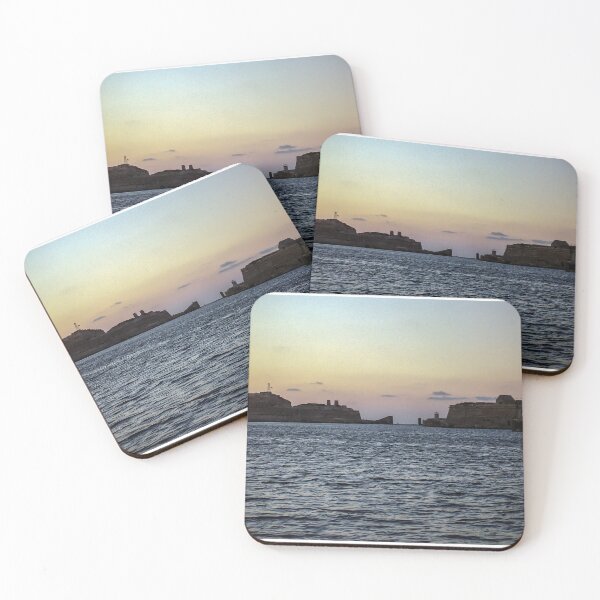 Item preview, Sunlit Stone Seawall With People Fishing Along Coastal Promenade At Golden Hour designed and sold by Nmallia.