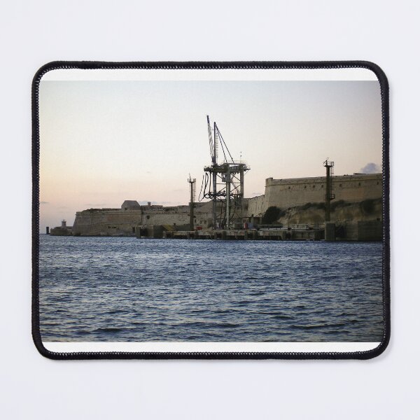 Item preview, Sunlit Stone Seawall With People Fishing Along Coastal Promenade At Golden Hour designed and sold by Nmallia.