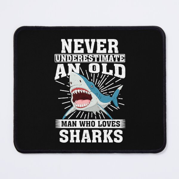 Item preview, Never Underestimate An Old Man Who Loves Sharks designed and sold by CosmoKitsch.