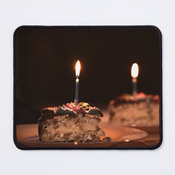 Item preview, Two pieces of cake with a candle, a cozy birthday atmosphere, warm brown tones. designed and sold by RinaZik.