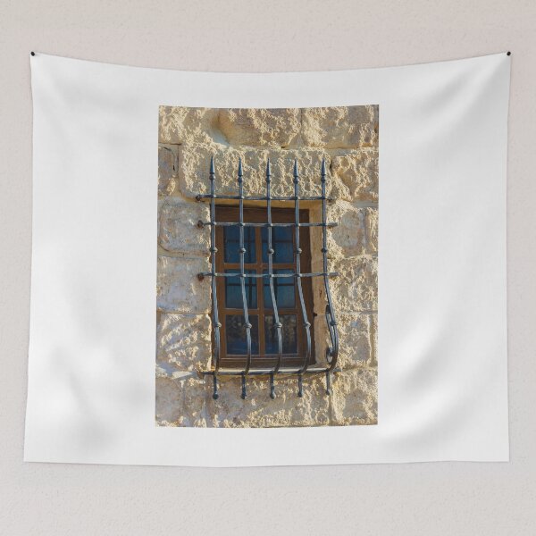 Item preview, Rustic Window With Iron Bars Set Into A Stone Wall, Sunlit Exterior Architectural Feature designed and sold by Nmallia.
