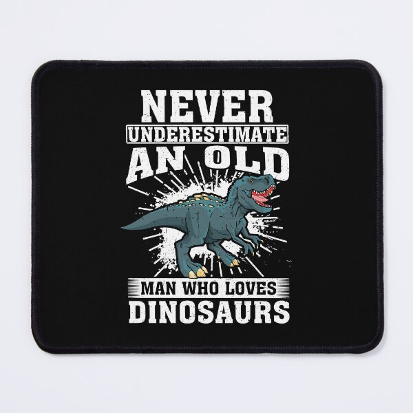Item preview, Never Underestimate An Old Man Who Loves Dinosaurs designed and sold by CosmoKitsch.
