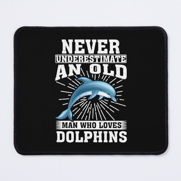 Item preview, Never Underestimate An Old Man Who Loves Dolphins  designed and sold by CosmoKitsch.
