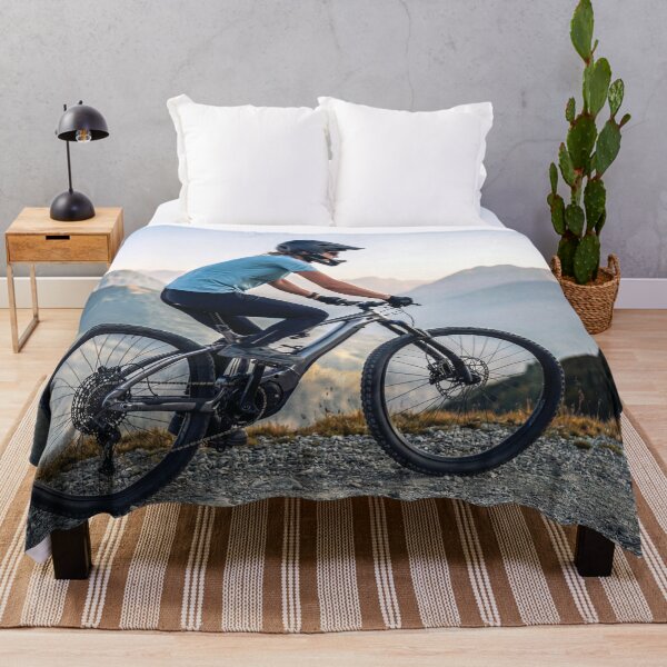 Item preview, Female Electric Mountain Biker Riding Alpine Ridge Trail in Early Morning Light designed and sold by Hinson MTB Visuals.
