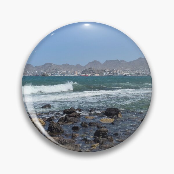 Item preview, Mindelo Coastline – Rocks, Waves, and Cityscape designed and sold by Felinephrame.