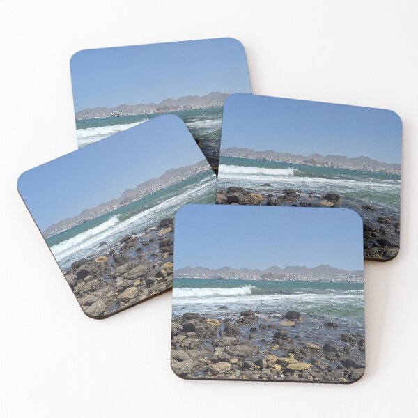 Item preview, Mindelo Coastline – Rocks, Waves, and Cityscape designed and sold by Felinephrame.