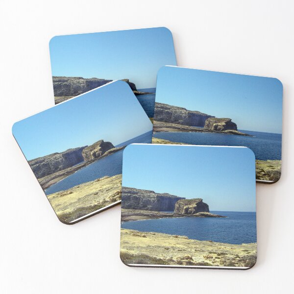Item preview, Rocky Coastal Cliffs and Blue Sea Under Clear Sky Over Remote Shoreline designed and sold by Nmallia.