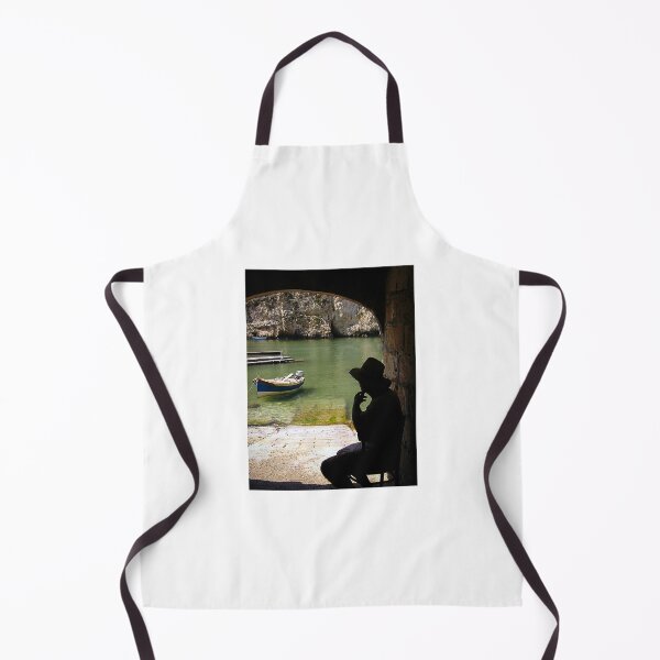 Item preview, Silhouette Of A Man In Hat Watching A Small Boat In A Quiet Coastal Harbor Under An Arch designed and sold by Nmallia.