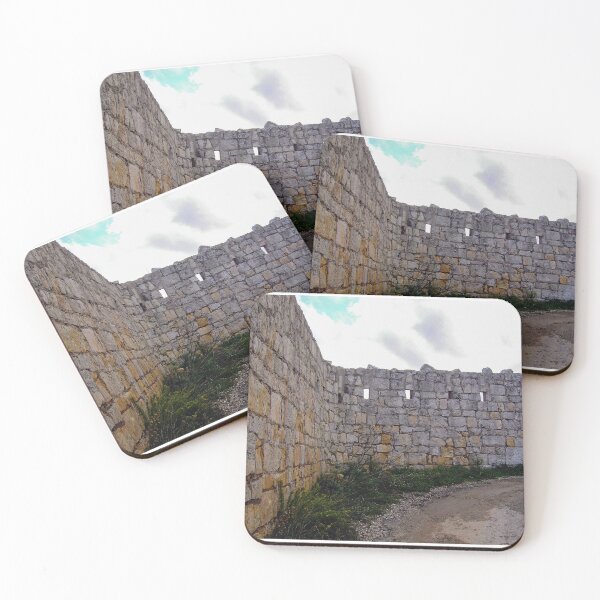 Item preview, Sunlit Stone Wall Along Coastal Dirt Path Overlooking Blue Sea and Clear Sky designed and sold by Nmallia.