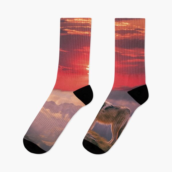 Item preview, Lone wolf on rocks against an alpenglow panorama designed and sold by Mauswohn.