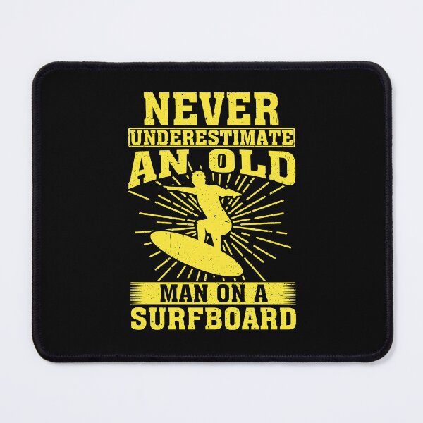 Item preview, Never Underestimate an Old Man on a Surfboard Surfing designed and sold by CosmoKitsch.