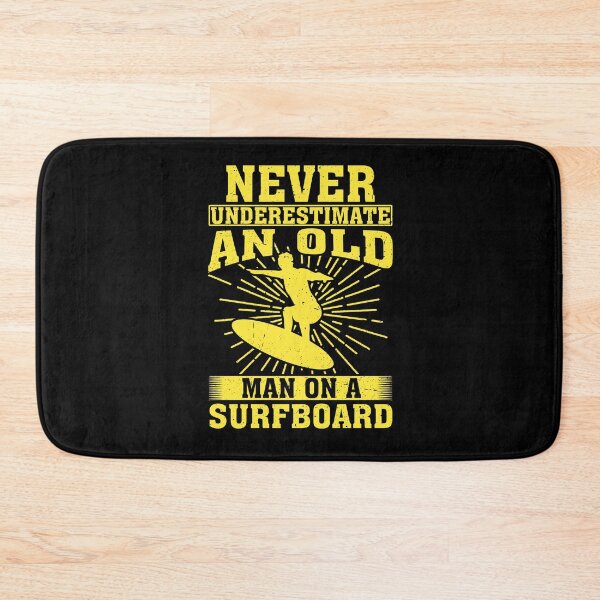 Item preview, Never Underestimate an Old Man on a Surfboard Surfing designed and sold by CosmoKitsch.