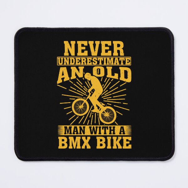 Item preview, Never Underestimate an Old Man With A BMX Bike designed and sold by CosmoKitsch.