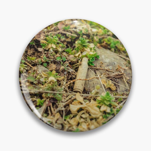 Item preview, Empty Bullet Shell Casing Discarded in Grass designed and sold by ADAG-ART.
