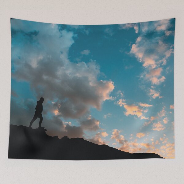 Item preview, Silhouette Walker Under Dramatic Sunset Sky designed and sold by Arturo Daniel Garcia Palomo.