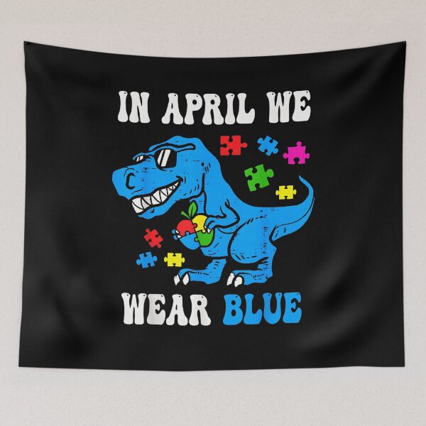 Item preview, in April We Wear Blue Autism Awareness Dino T-Rex Dinosaur designed and sold by Goleon12.