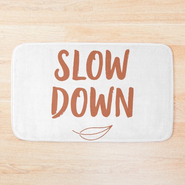 Item preview, Handwritten  Slow Down  lettering with a simple leaf icon on a white background, a minimal motivational quote promoting mindfulness, relaxation designed and sold by Dejbar.