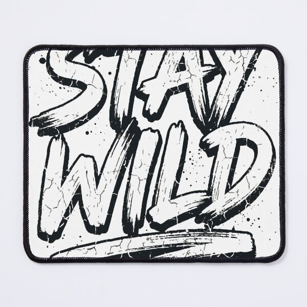 Item preview, White cotton T-shirt featuring bold STAY WILD hand-painted slogan in cracked beige and black typography with splatter and grunge texture, evoking a rebellious streetwear designed and sold by Dejbar.