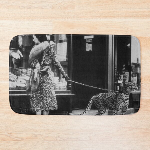 Item preview, American silent film actress Phyllis Gordon window-shopping in Earls Court, London 1939 with her four-year-old cheetah vintage black and white photograph designed and sold by Astrid Arkhangelsky.