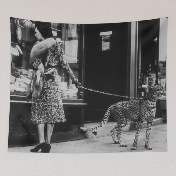 Item preview, American silent film actress Phyllis Gordon window-shopping in Earls Court, London 1939 with her four-year-old cheetah vintage black and white photograph designed and sold by Astrid Arkhangelsky.
