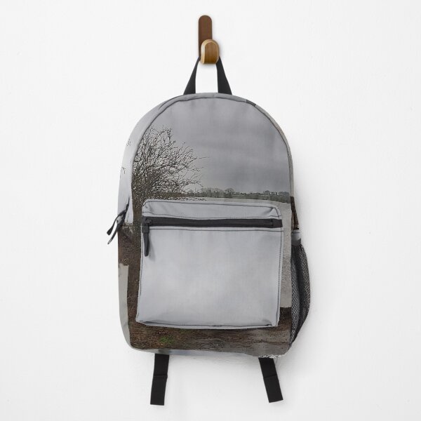 Item preview, Lonely Rowing boat On Shore Of Overcast Lough Under Gray Winter Sky designed and sold by ivon55.