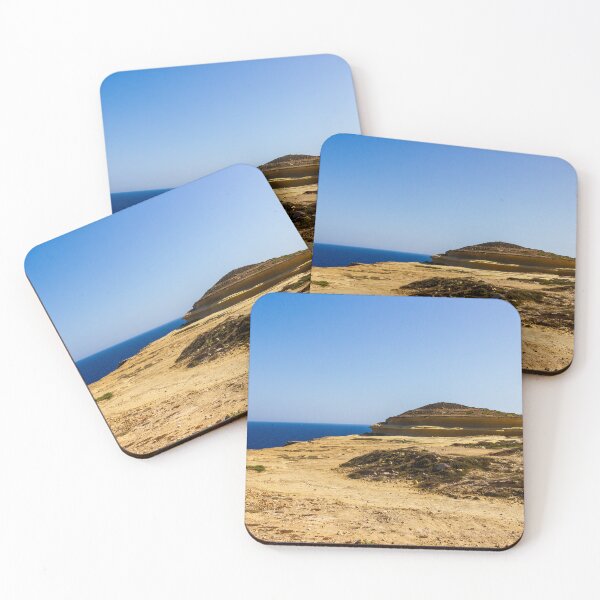 Item preview, Sunny Coastal Cliff Overlooking Deep Blue Sea With Sandy Rocky Shoreline And Clear Sky designed and sold by Nmallia.