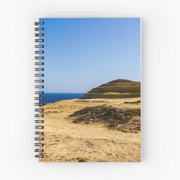 Item preview, Sunny Coastal Cliff Overlooking Deep Blue Sea With Sandy Rocky Shoreline And Clear Sky designed and sold by Nmallia.
