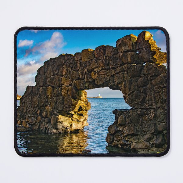 Item preview, The lighthouse at Sassnitz on Rügen Island, DE as seen through a rock arch designed and sold by Michael Brewer.