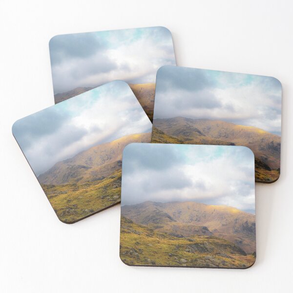 Item preview, Sunlight Breaking Through Clouds Over Mountain Landscape designed and sold by Clauando.