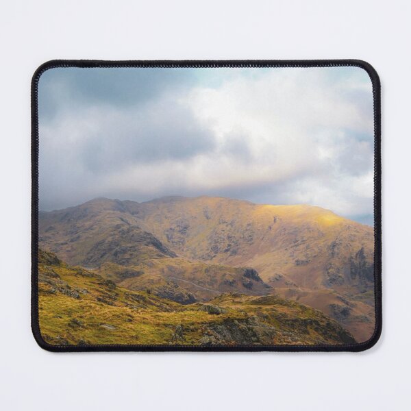Item preview, Sunlight Breaking Through Clouds Over Mountain Landscape designed and sold by Clauando.